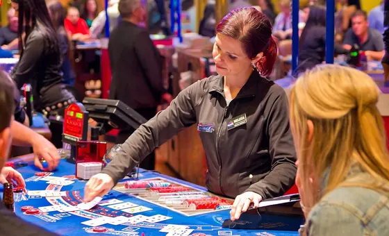 Dealer at a card table